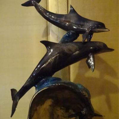LOT 145: LARGE PATINATED BRONZE SCULPTURE, DOLPHINS AND SURFER