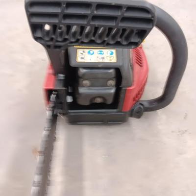 Homelite Ranger Chain saw - Power stroke 33 cc Engine with gas can