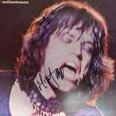 The Rolling Stones Milestones signed album. GFA Authenticated