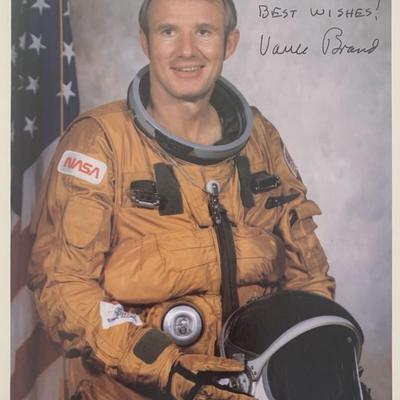 Astronaut Vance Brand signed official NASA photo. GFA Authenticated. 