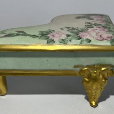 Vintage Hand Painted Piano Porcelain Trinket Box 3" x 5.5" in VG Preowned Condition.