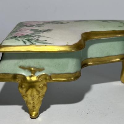 Vintage Hand Painted Piano Porcelain Trinket Box 3" x 5.5" in VG Preowned Condition.