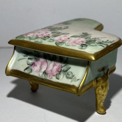 Vintage Hand Painted Piano Porcelain Trinket Box 3" x 5.5" in VG Preowned Condition.