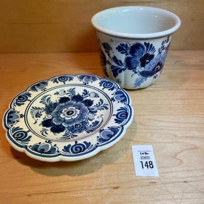 Delft blue and white cup and plate