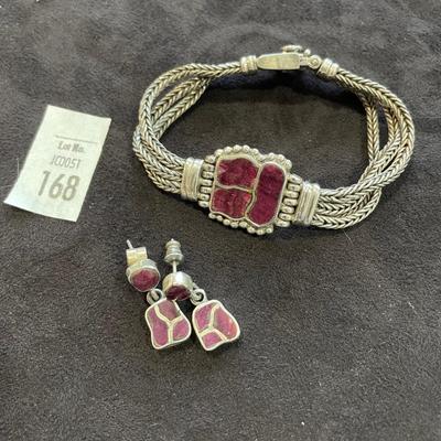 Sterling bracelet with red stone inlaid. Matching earrings.