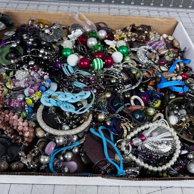 Tray full of Costume Jewelry: Bracelets and Rings