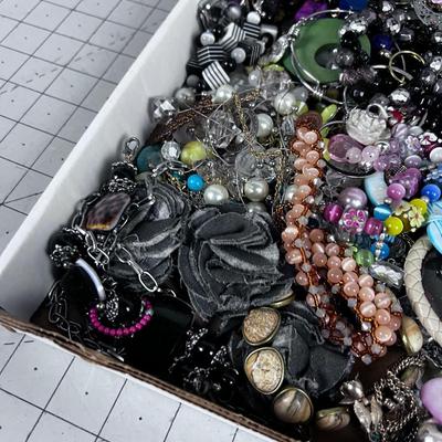 Tray full of Costume Jewelry: Bracelets and Rings