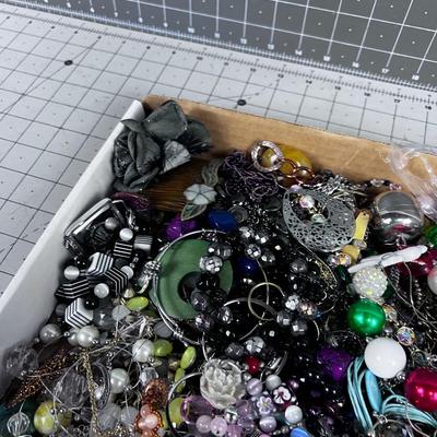 Tray full of Costume Jewelry: Bracelets and Rings