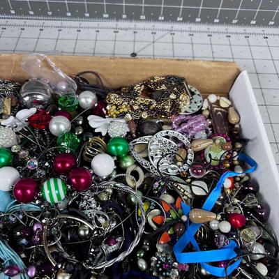 Tray full of Costume Jewelry: Bracelets and Rings