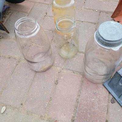 Compressor hose reel, vintage Mason jars and wheel chocks