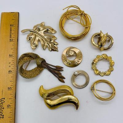 Lot of Gold toned Pins / Brooches