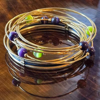 Gold Tone Bangles with Green & Purple Beads