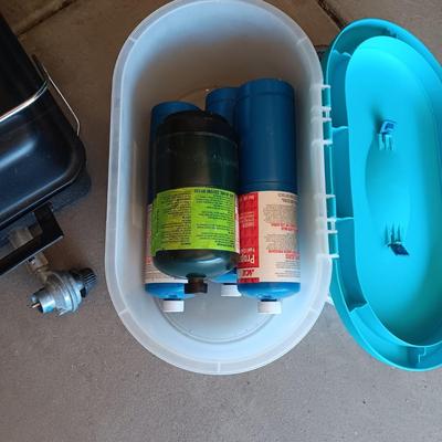 HIBACHI, CANS OF PROPANE, BEVERAGE COOLER AND AN AXE