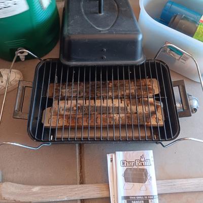 HIBACHI, CANS OF PROPANE, BEVERAGE COOLER AND AN AXE