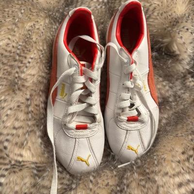 Puma orange and white size 6