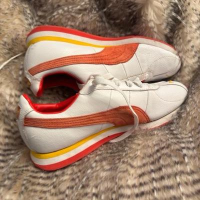 Puma orange and white size 6