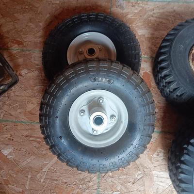 2 NEW 4.1/3.50-4 WHEELS AND 2 USED ONES