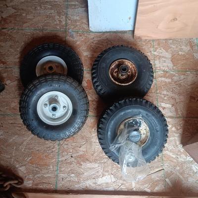 2 NEW 4.1/3.50-4 WHEELS AND 2 USED ONES