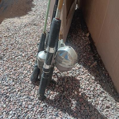 FULL TACKLE BOX AND SEVERAL FISHING POLES WITH REELS