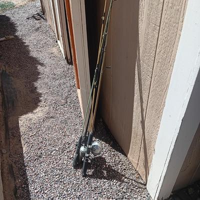 FULL TACKLE BOX AND SEVERAL FISHING POLES WITH REELS