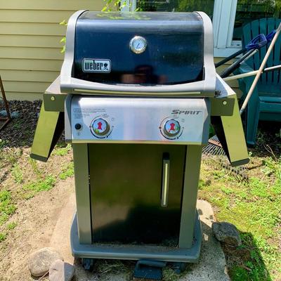 LOT 8 O: Weber Spirit E-210 Two Burner Propane Gas Grill W/Cabinet, Drop Down Sides, & Cover