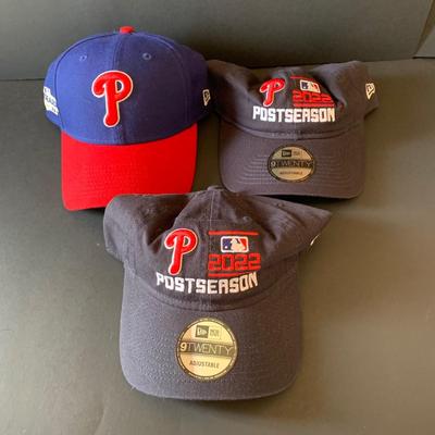 LOT 115 L: Philadephia Phillies 2022-2023 Collection: Hats, Beanie, T-Shirts, Pins, Sunglasses, & 2022 World Series MLB Official Programs