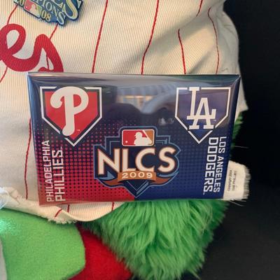LOT 117 L: 2009 Philadephia Phillies Collection: Shirts, Towels, Travel Mugs, & More