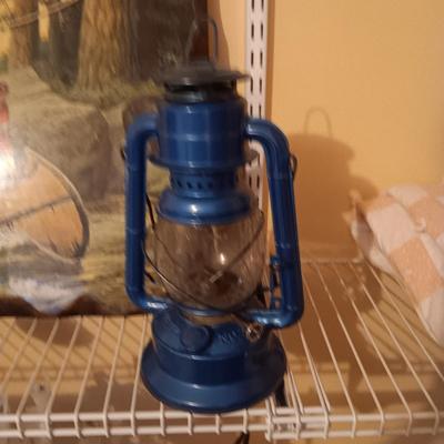 VINTAGE DECOUPAGE PICTURE, DIETZ NO 30 LANTERN AND CAST IRON SCOUTING HAT