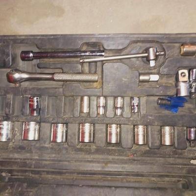 SOCKET SET AND A PIPE WRENCH