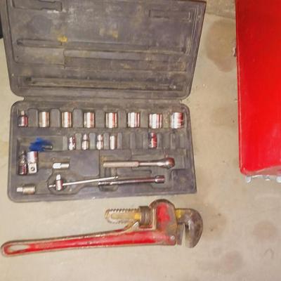 SOCKET SET AND A PIPE WRENCH