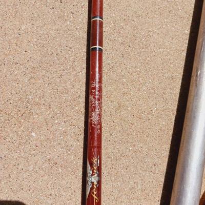 TACKLE BOX WITH SOME TACKLE AND 2 FISHING POLES