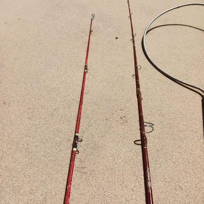 TACKLE BOX WITH SOME TACKLE AND 2 FISHING POLES