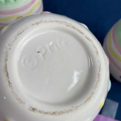 3 porcelain egg candles.