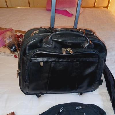 BRIEFCASE ON WHEELS W/HANDLE, 2 UMBRELLAS, BACKPACK AND MORE