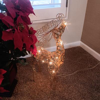 LARGE FAUX POINSETTIA IN A CERAMIC POT AND A LIGHTED METAL REINDEER