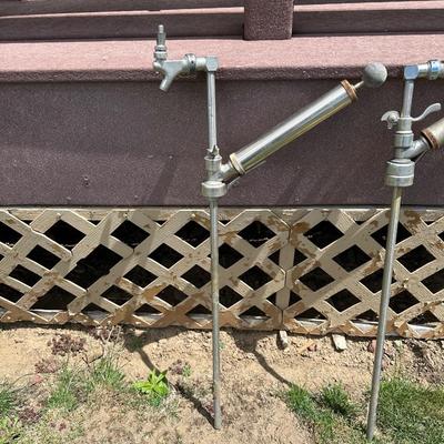 REPURPOSED KEG TAPS FOR YARD ART