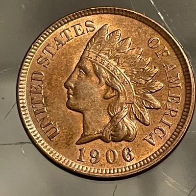 1906 UNCIRCULATED/RB CONDITION INDIAN HEAD CENT AS PICTURED.