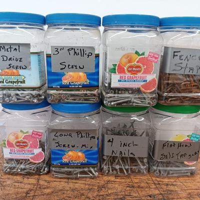 8 plastic containers with hardware - Screws - nails - and more