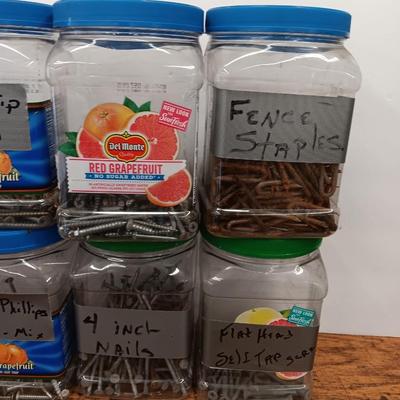 8 plastic containers with hardware - Screws - nails - and more