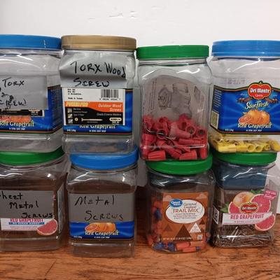 8 lidded plastic containers with assortment of different sized wire nuts - nails and more