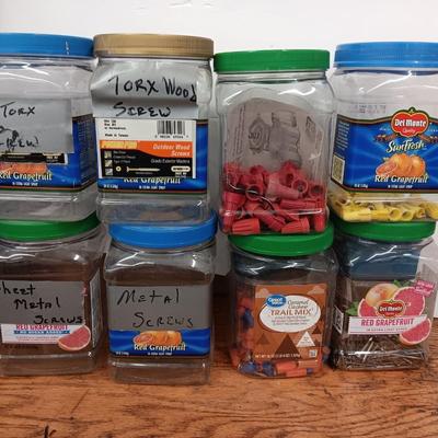 8 lidded plastic containers with assortment of different sized wire nuts - nails and more