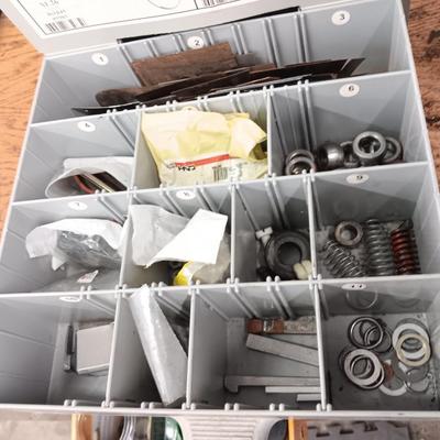 Drawered storage box with as assortment of brake parts small washers nuts - bolts - and hay baler bolts