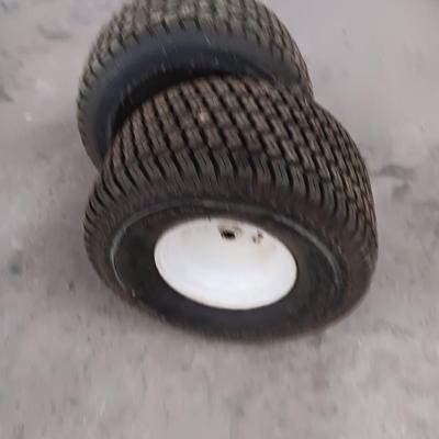 Two Small tires - 20x10.00 - 8 NHS Kenda & Trac card C/T- with rims