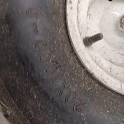 Two Small tires - 20x10.00 - 8 NHS Kenda & Trac card C/T- with rims