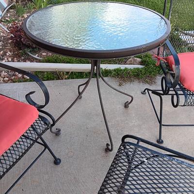 Nice metal patio chairs with end table / footstool and small table