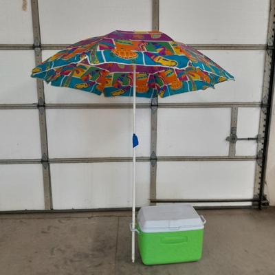 Neon green Rubbermaid cooler and a Fun bright colorful umbrella