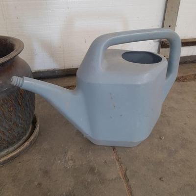 Nice ceramic flowerpot with watering pitcher
