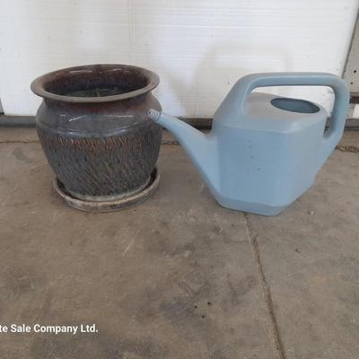 Nice ceramic flowerpot with watering pitcher