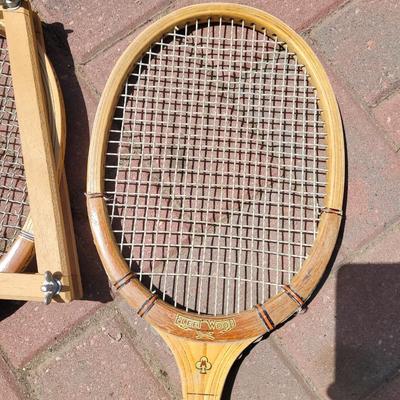 Vintage and antique tennis rackets, six baseballs and a boomerang