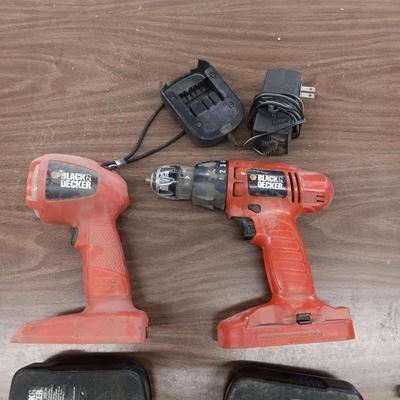 Black & Decker flashlight and drill with batteries and charger